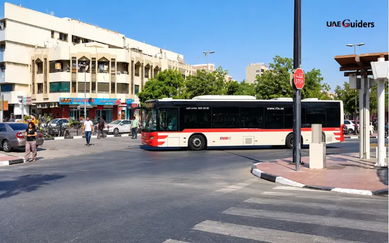 Dubai RTA bus crossing a street near Al Satwa Bus Station